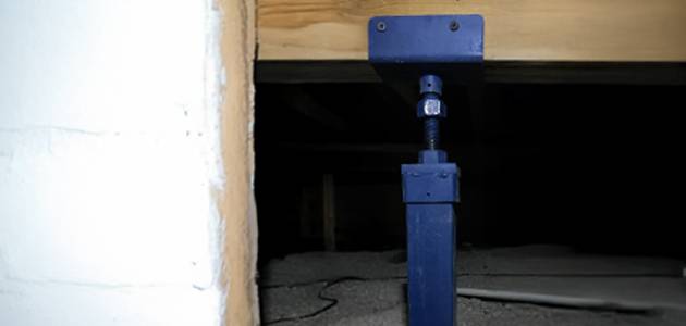 a blue metal post with a bolt