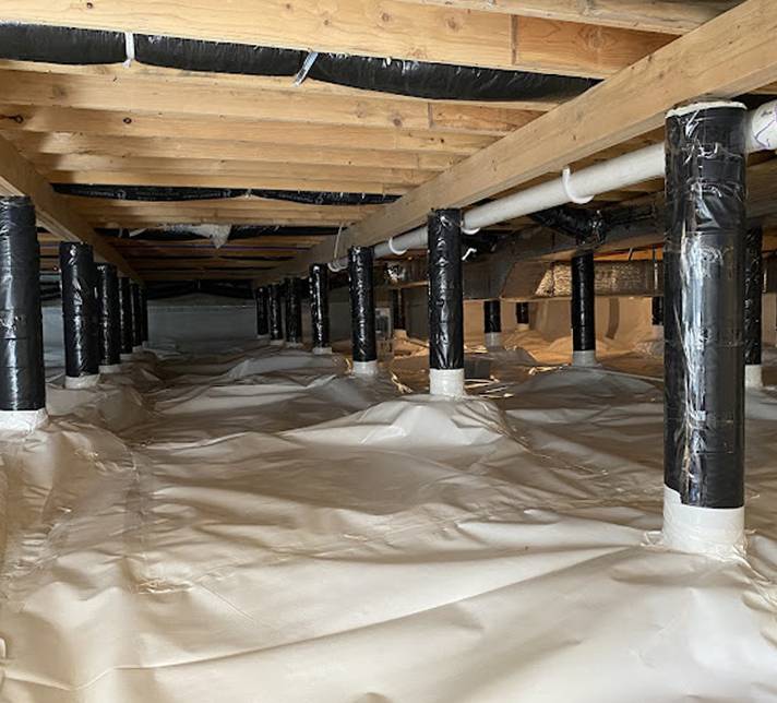 a basement with plastic coverings