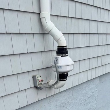 Radon mitigation system on wall